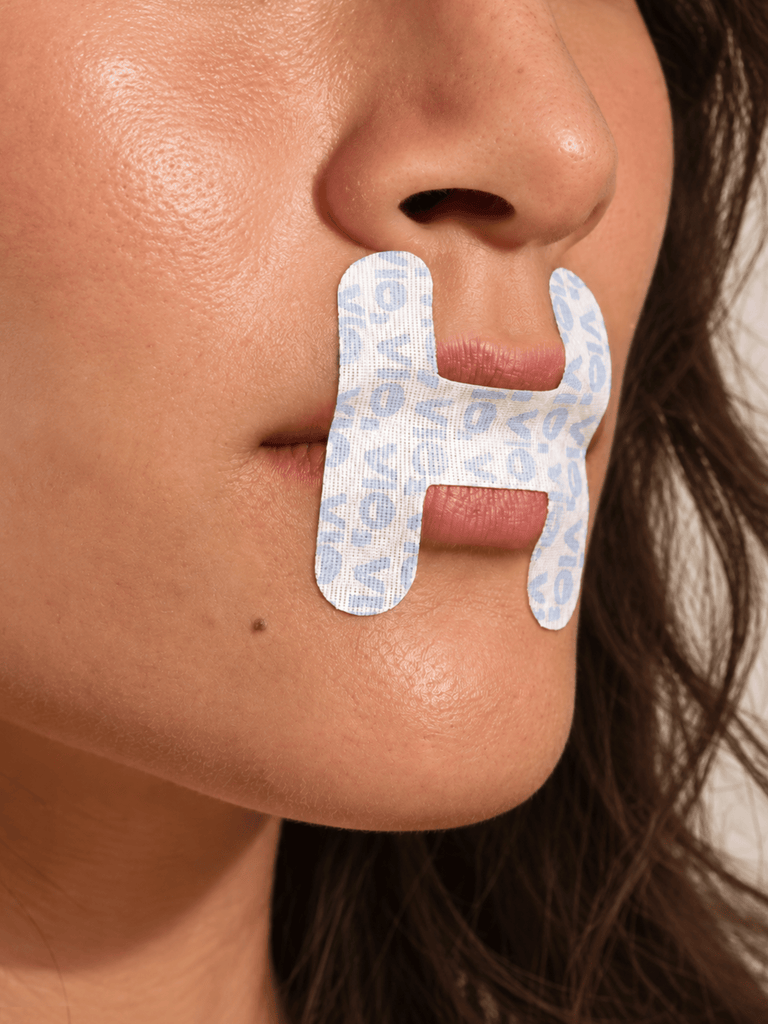 VIO2™ Skin+ Skincare-Infused Mouth Tape in packaging, designed for health and beauty use, with sleek branding and product details visible.