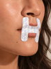 VIO2™ Skin+ Skincare-Infused Mouth Tape in packaging, designed for health and beauty use, with sleek branding and product details visible.